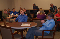 Catching up on the news and email in the Newsroom duing a break